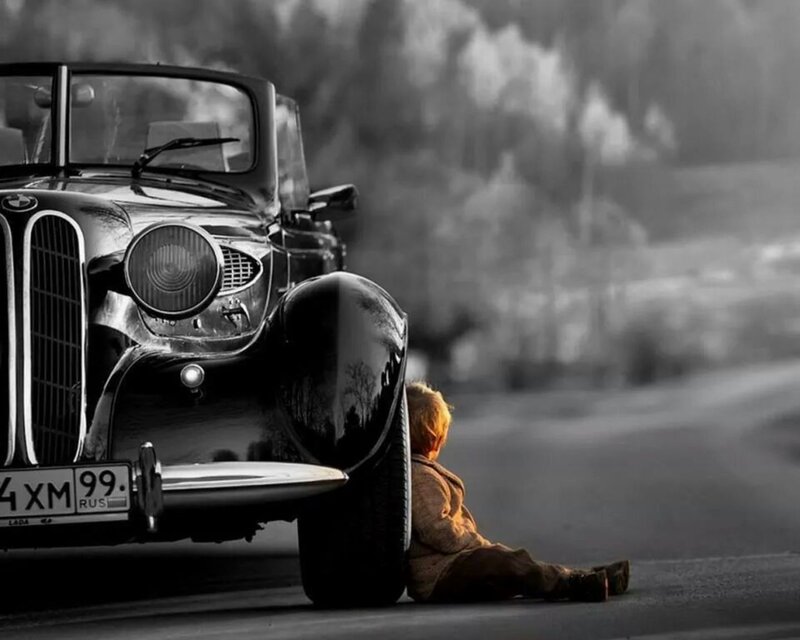 Child Sitting by Car — Black