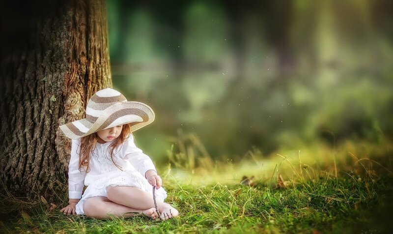 Child Sitting by Tree — Green