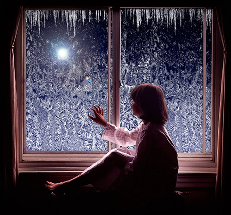 Child Sitting by Window — Blue