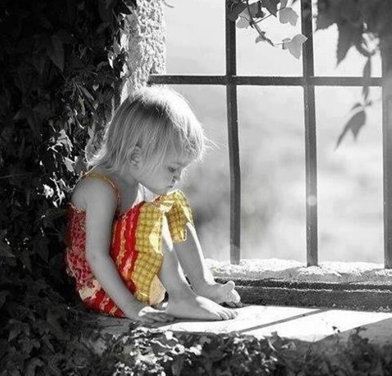 Child Sitting by Window — Red