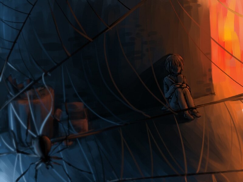 Child Sitting in Dark Room