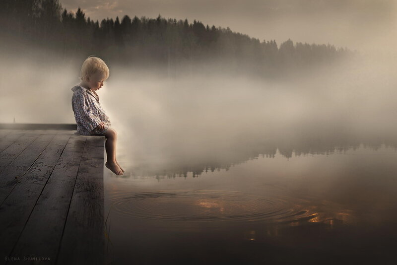 Child Sitting on Dock — Brown, Serene