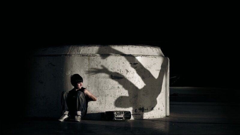 Child Sitting on Floor — Black