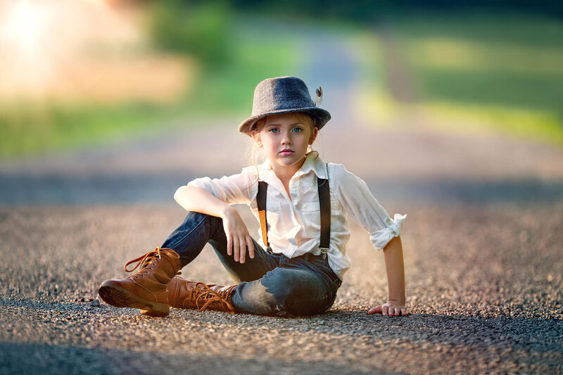 Child Sitting on Road — Brown, Serene