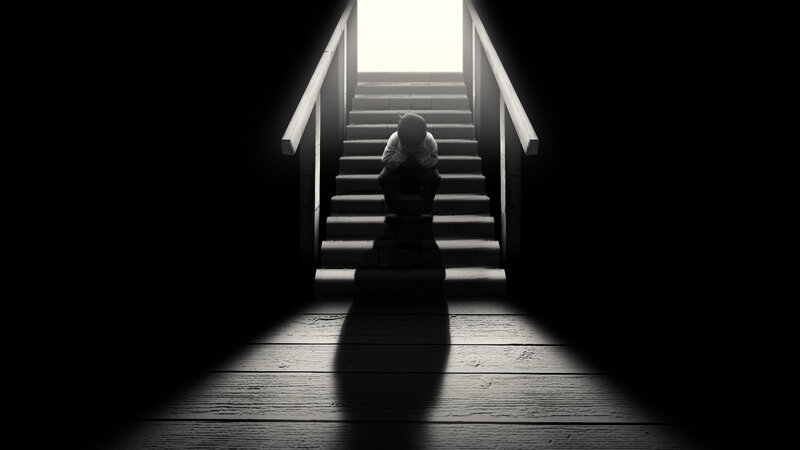 Child Sitting on Stairs