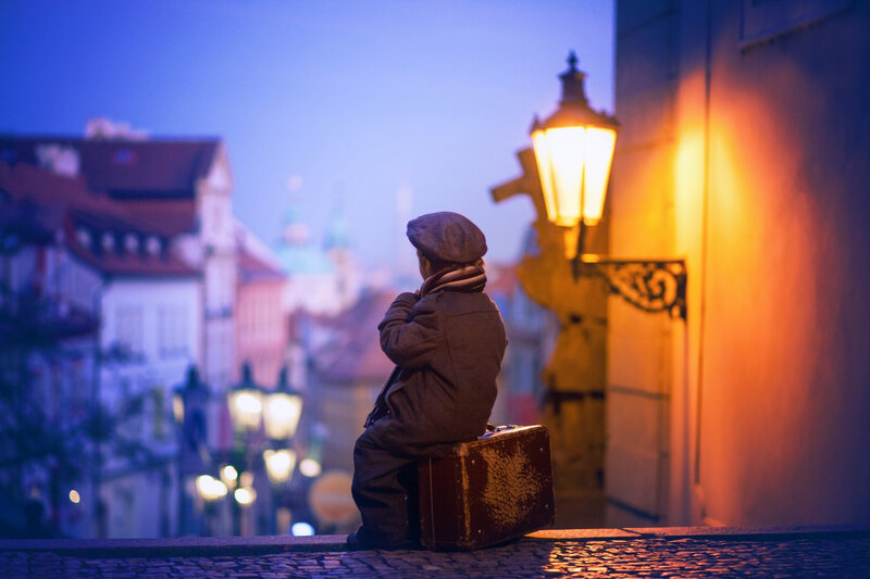 Child Sitting on Suitcase — Blue
