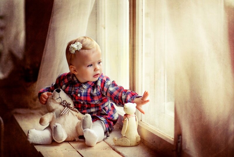 Child Sitting on Windowsill — Beige