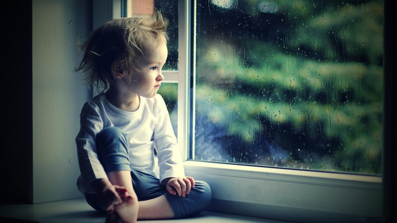 Child Sitting on Windowsill — White