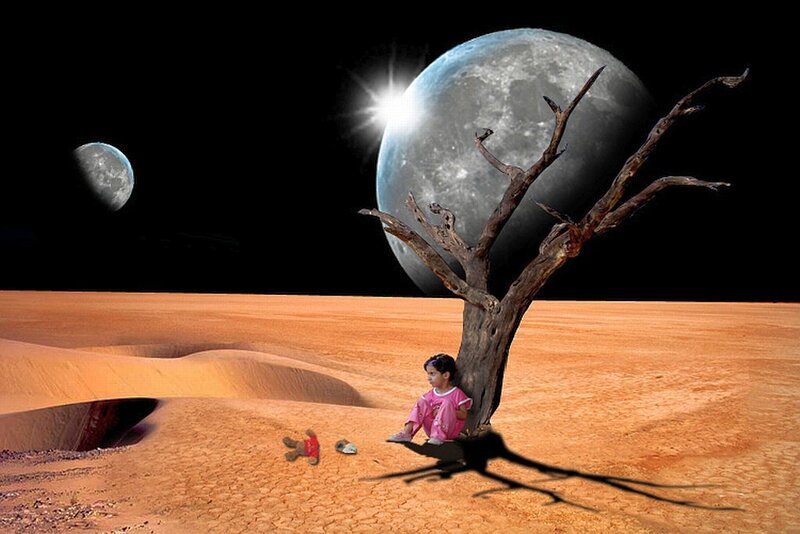 Child Sitting under Tree