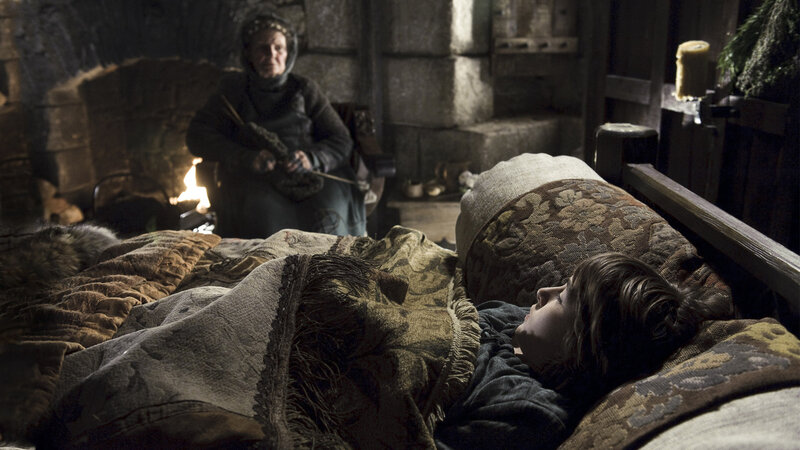 Child sleeping in a castle room