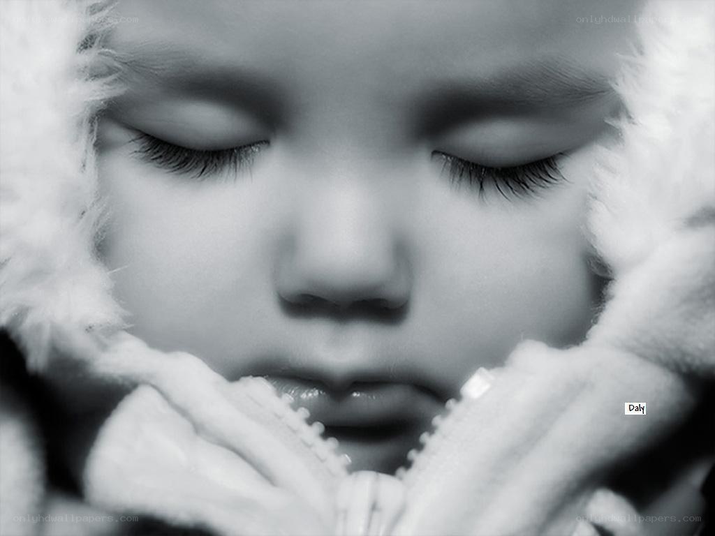 child sleeping in winter coat