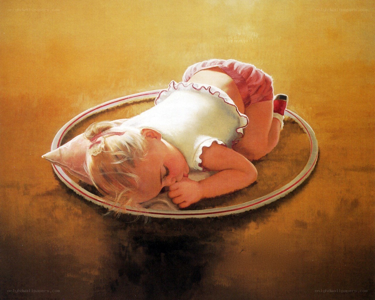 Child sleeping on a plate