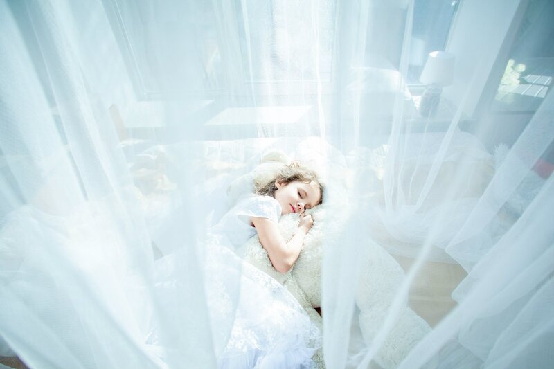 Child Sleeping on Bed — White, Serene, Morning