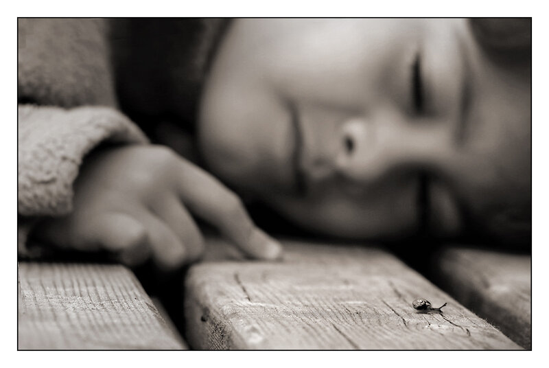 Child Sleeping on Wood