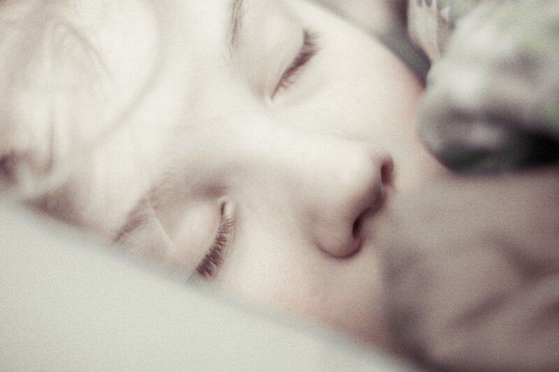 Child Sleeping Peacefully — White