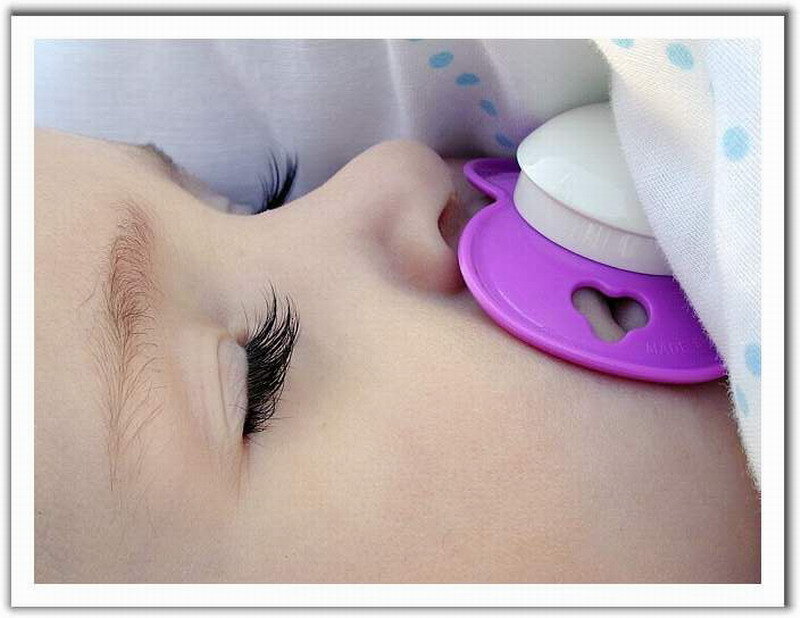Child Sleeping with Pacifier