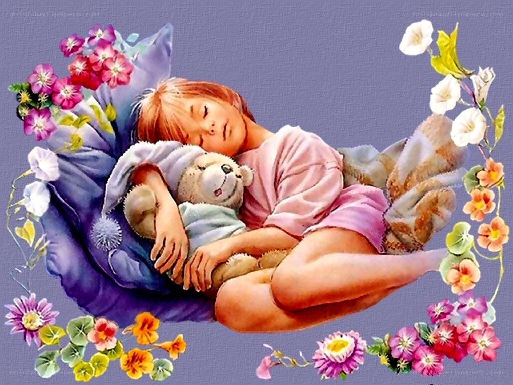 child sleeping with teddy bear
