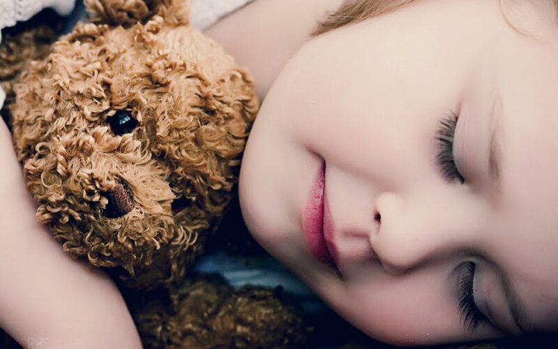 Child Sleeping with Teddy Bear — Brown