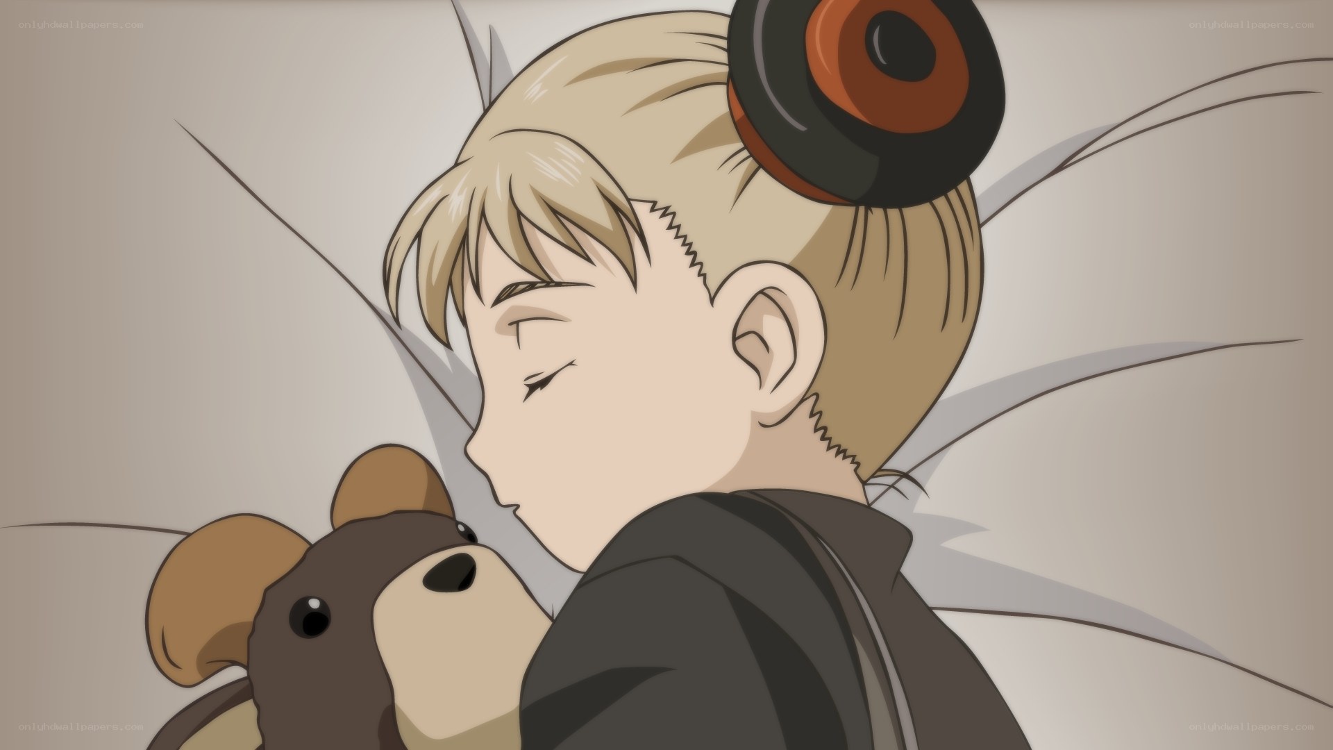 child sleeping with teddy bear