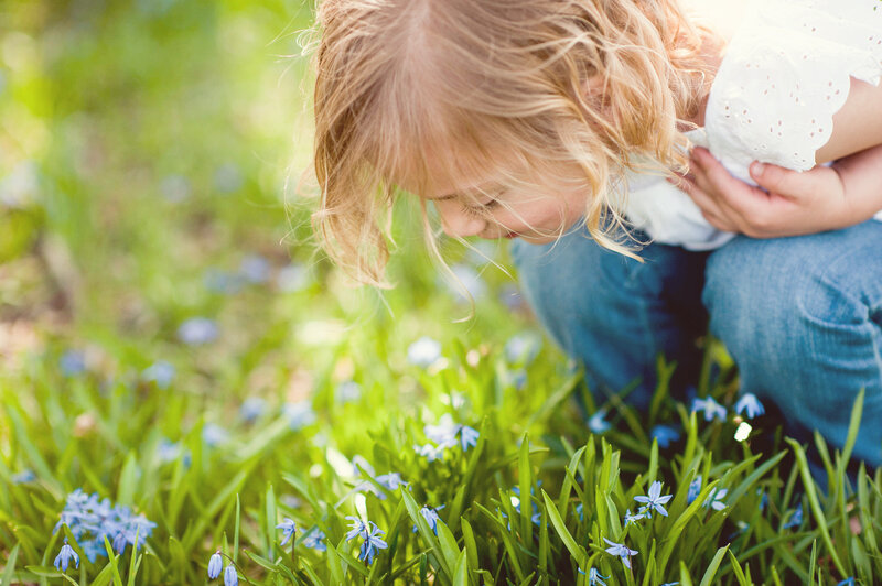 Child Smelling Flowers — Green