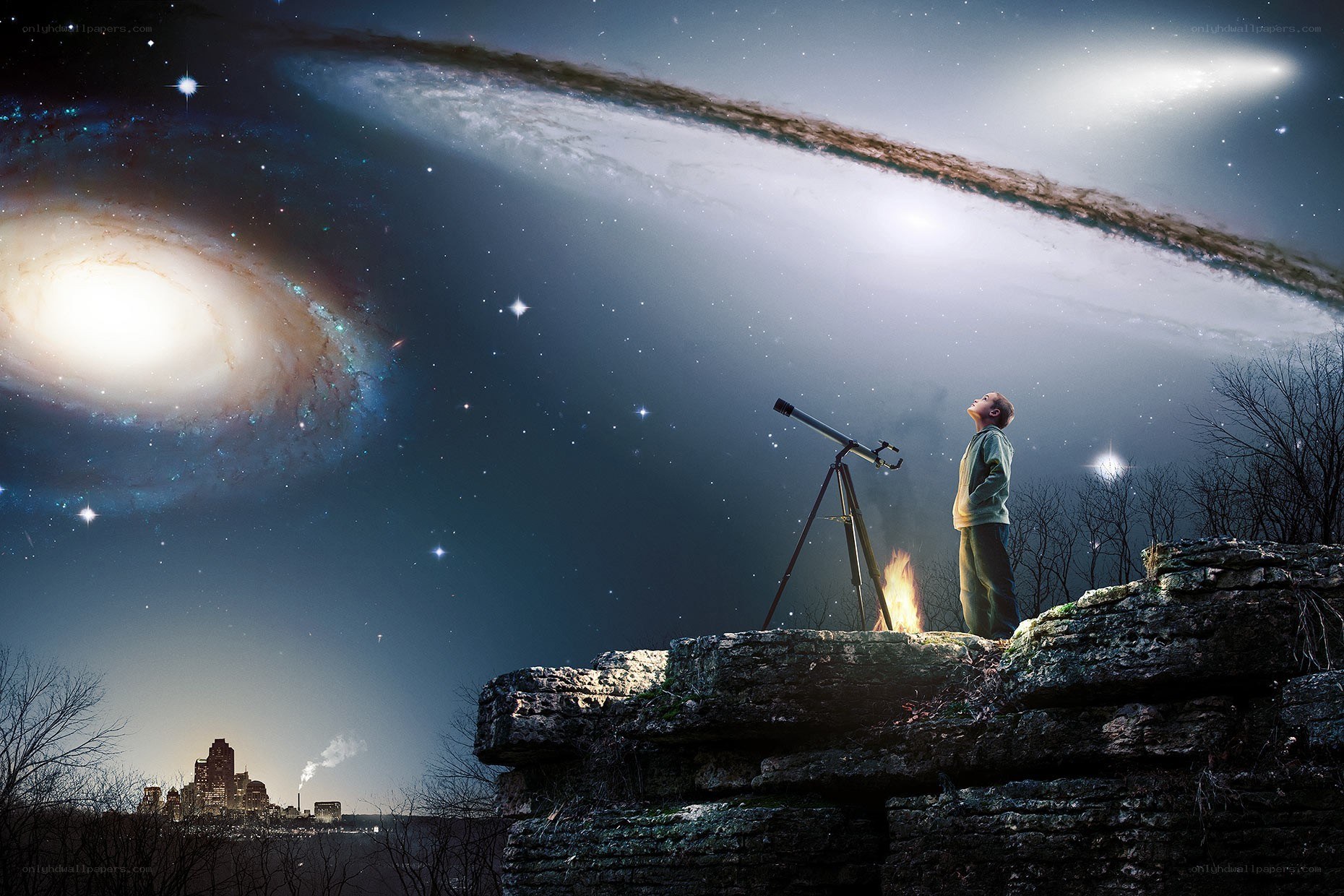 Child stargazing on a cliff