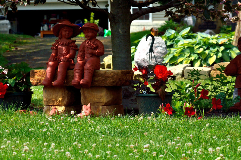 Child Statues on Bench