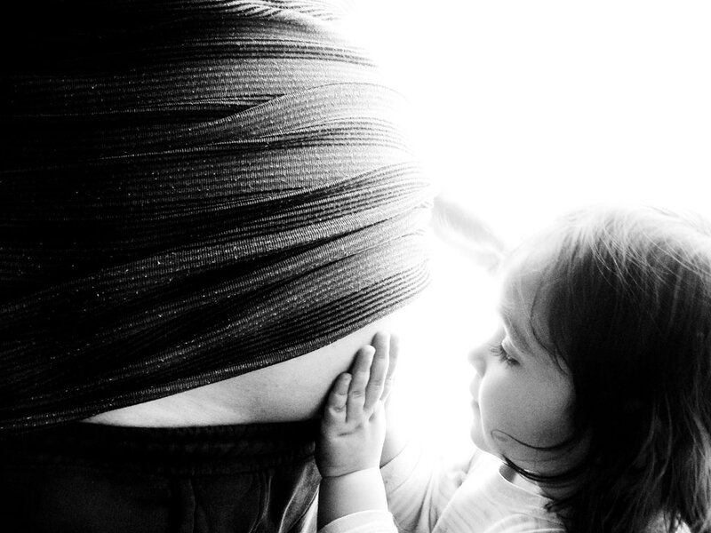 Child Touching Pregnant Belly
