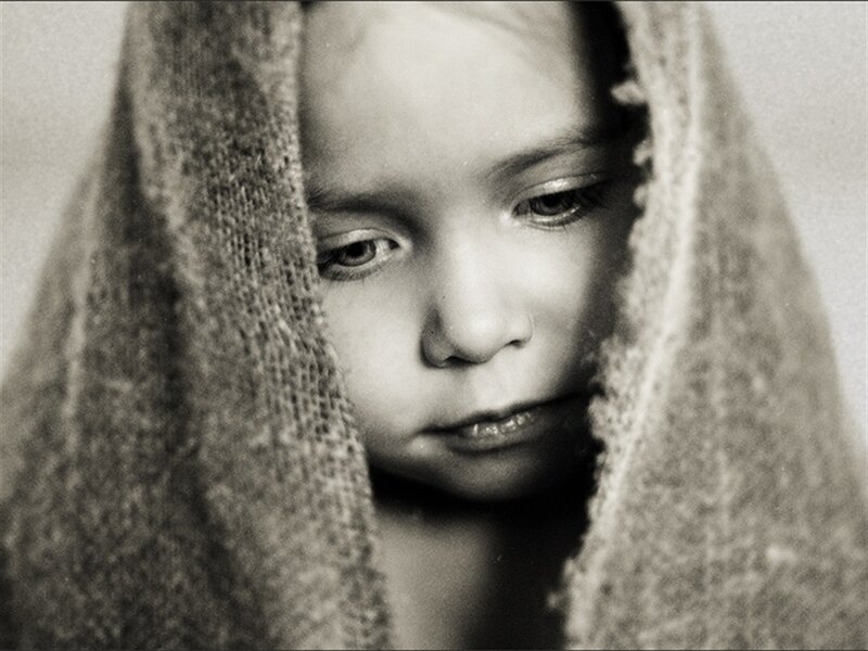 Child under Blanket