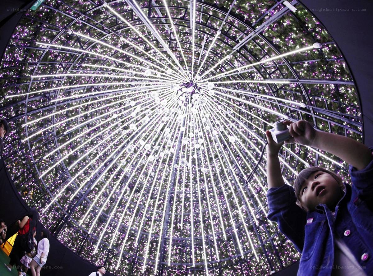 Child under light dome