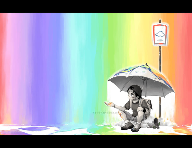 child under rainbow umbrella