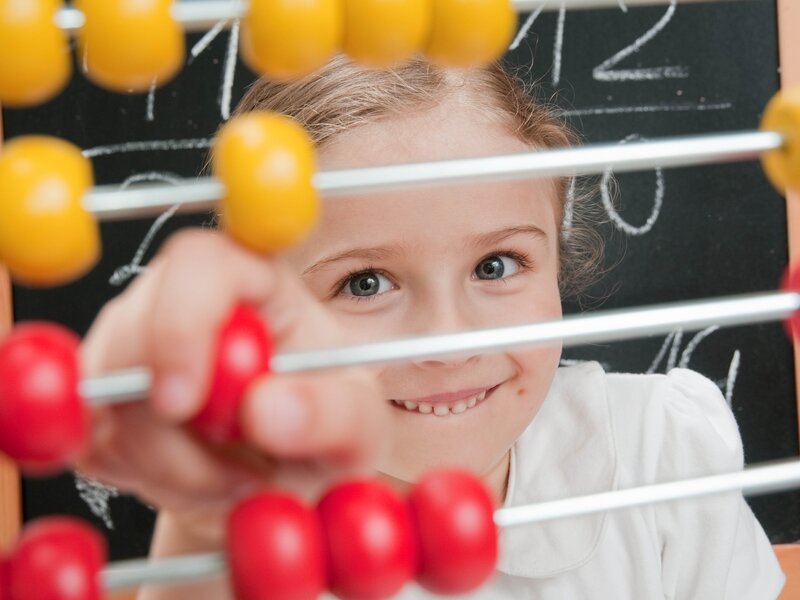 child using abacus for math