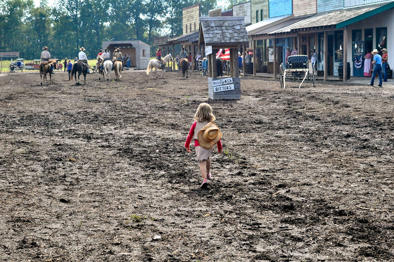 Child Walking in Mud
