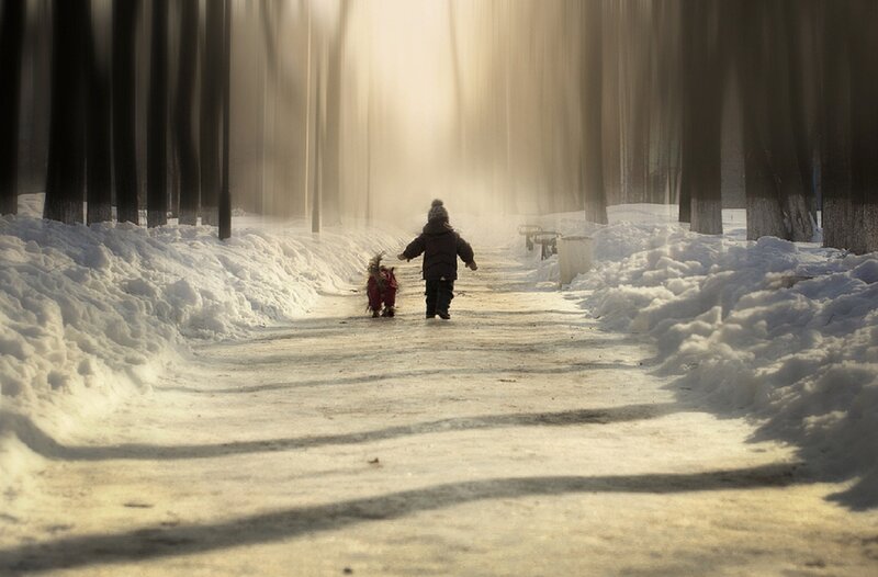 Child Walking in Snow