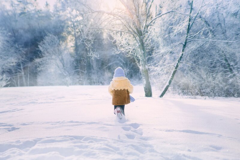 Child Walking in Snow — White, Serene