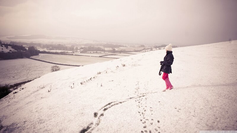 Child Walking in Snow — White