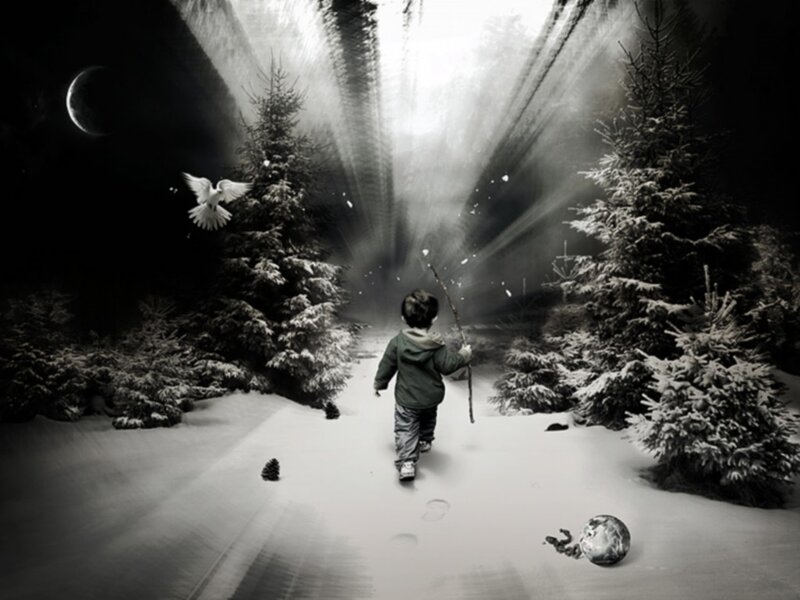child walking in snowy forest