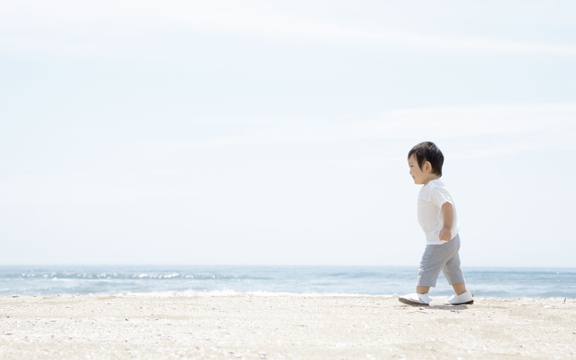 child walking on beach