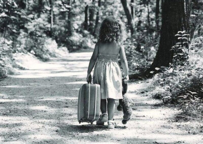 Child Walking with Suitcase
