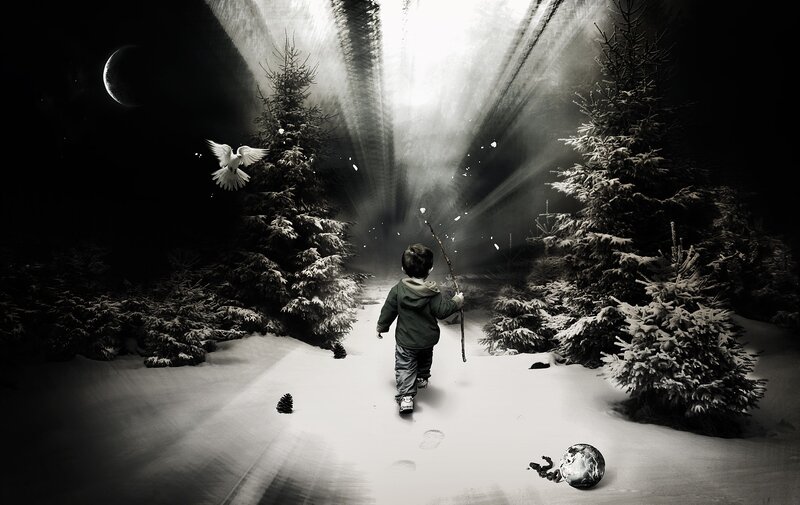 child walks through snowy forest
