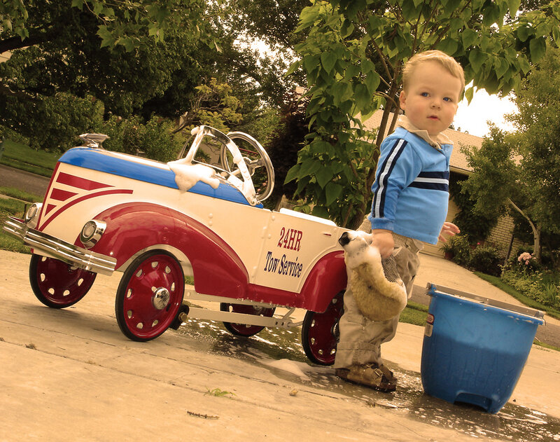 Child Washing Toy Car