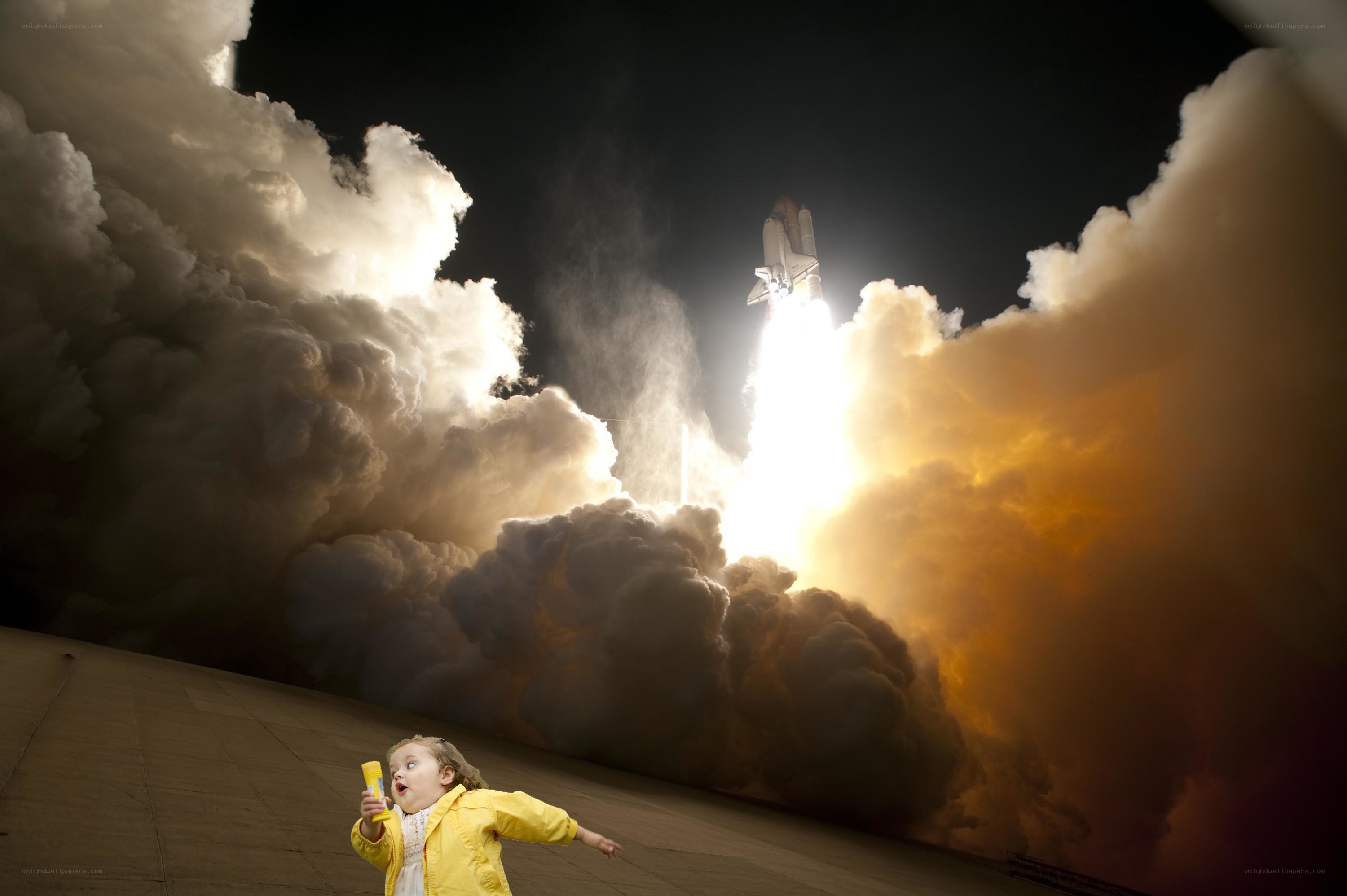 Child watching space shuttle launch