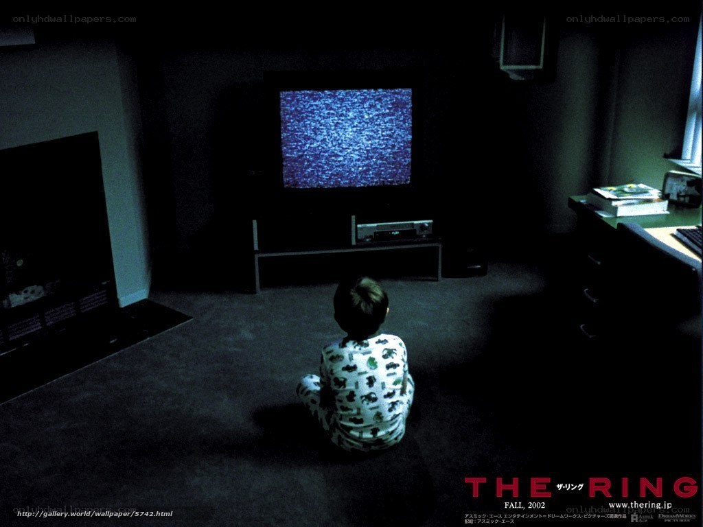 Child watching static on TV