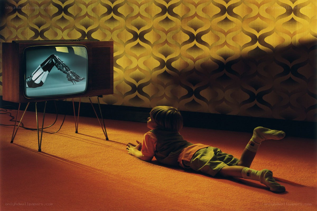 Child watching TV on the floor