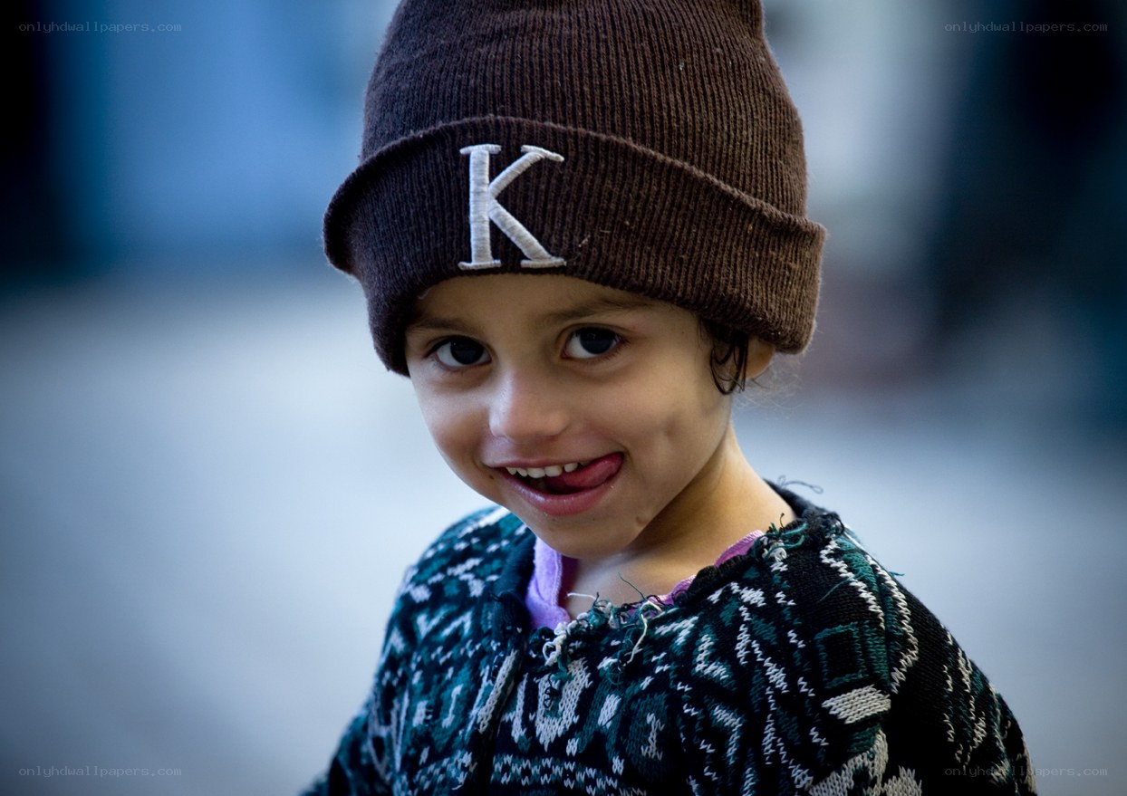 child wearing a beanie hat
