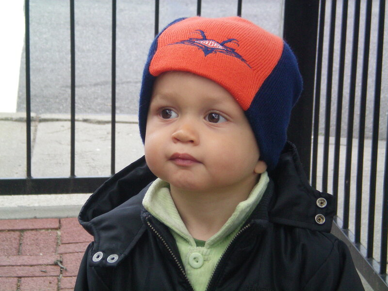 child wearing beanie hat