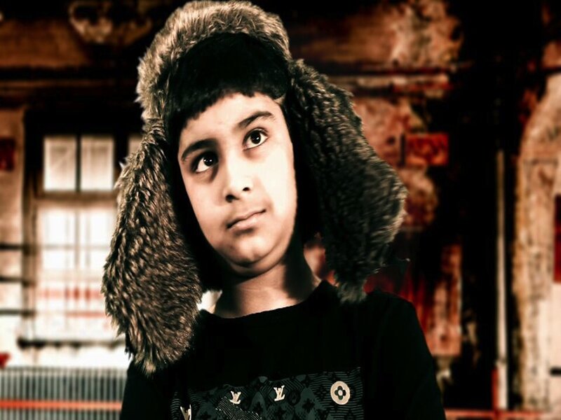 Child Wearing Fur Hat