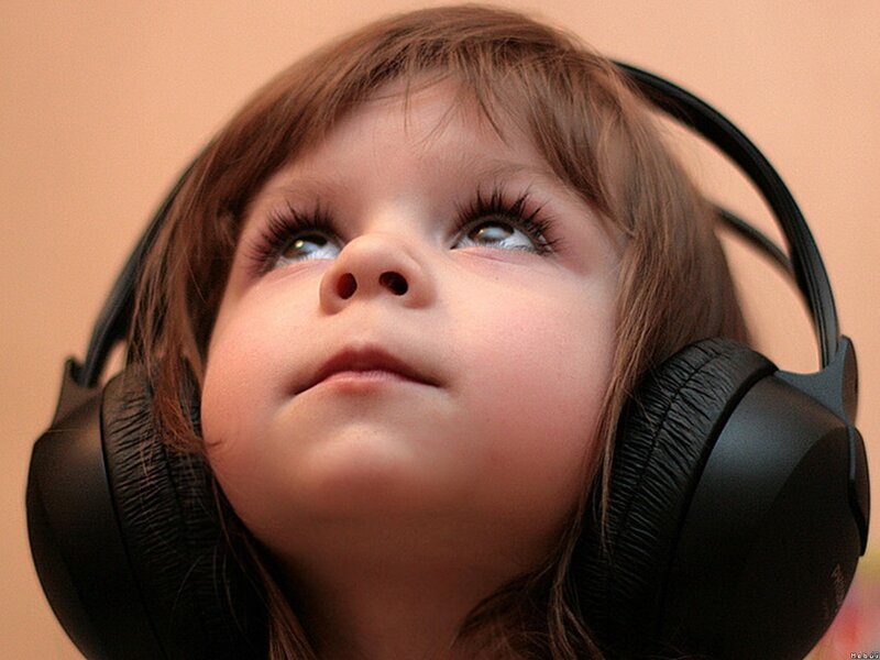 child wearing headphones