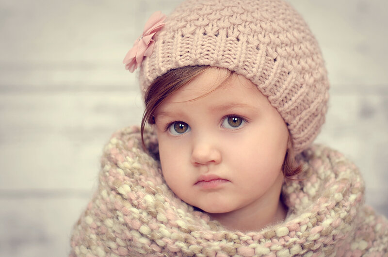 Child Wearing Knit Hat — Pink