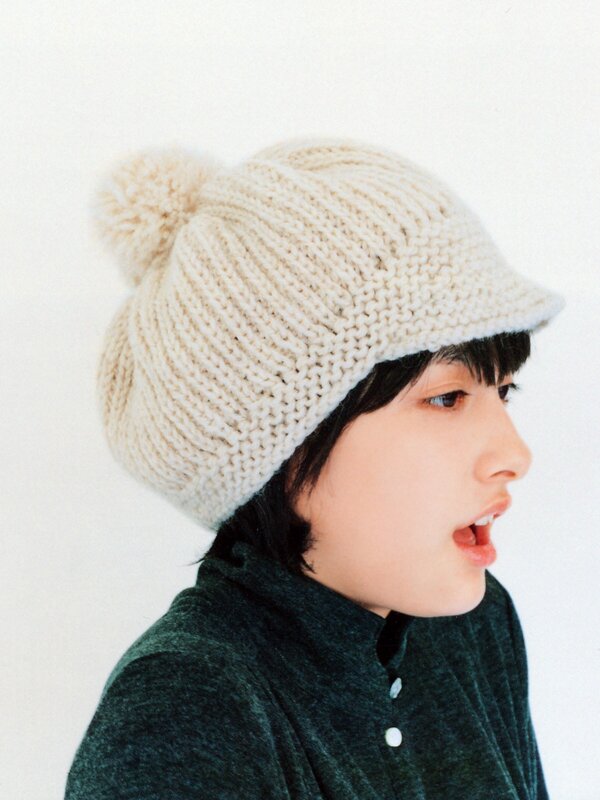 child wearing knit hat