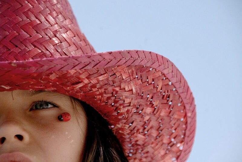 Child Wearing Red Hat — Calm